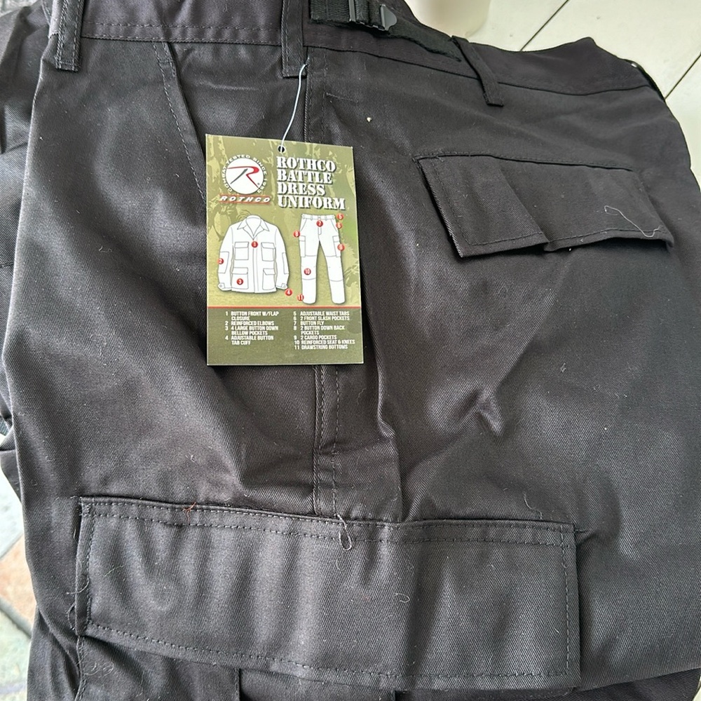 NWT Rothco Pants Adjustable waist 31-35 from a smoke free home. Black in color